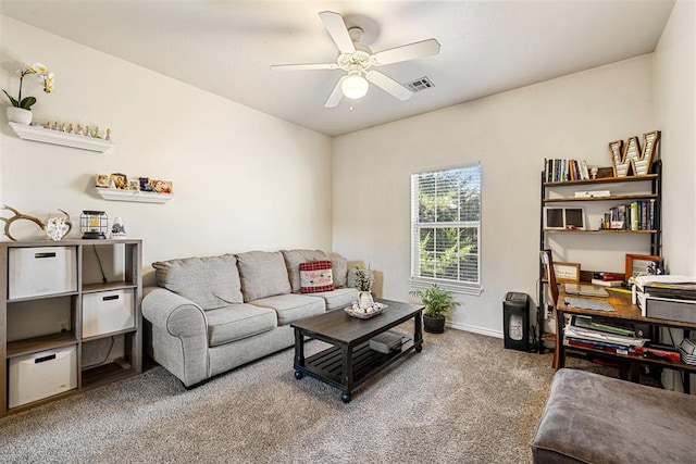 living room with carpet flooring and ceiling fan