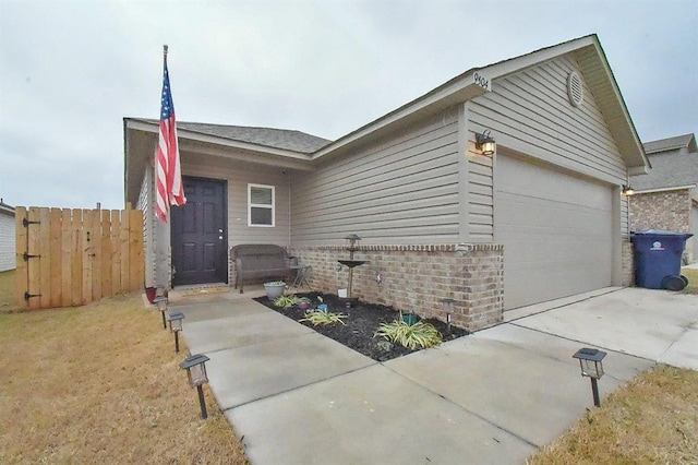 ranch-style home with a garage