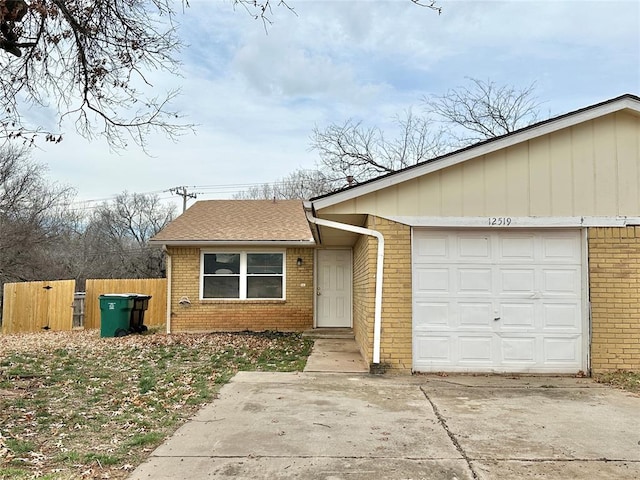 single story home featuring a garage