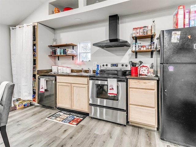 kitchen featuring appliances with stainless steel finishes, light brown cabinetry, wall chimney range hood, light hardwood / wood-style flooring, and lofted ceiling