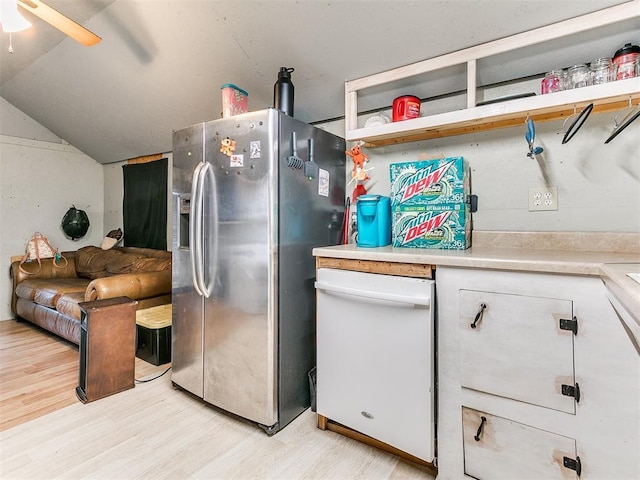 kitchen featuring stainless steel fridge, light hardwood / wood-style flooring, white dishwasher, and vaulted ceiling