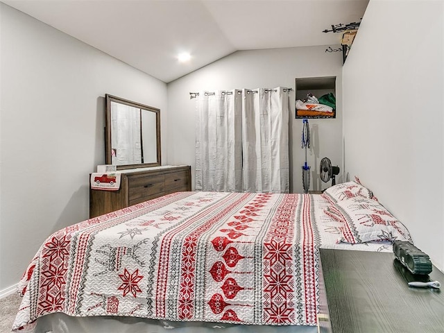 bedroom with vaulted ceiling