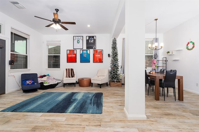 24 Carat Dr, Yukon, OK 73099 - living area with a chandelier, a ceiling fan, wood finished floors, and recessed lighting