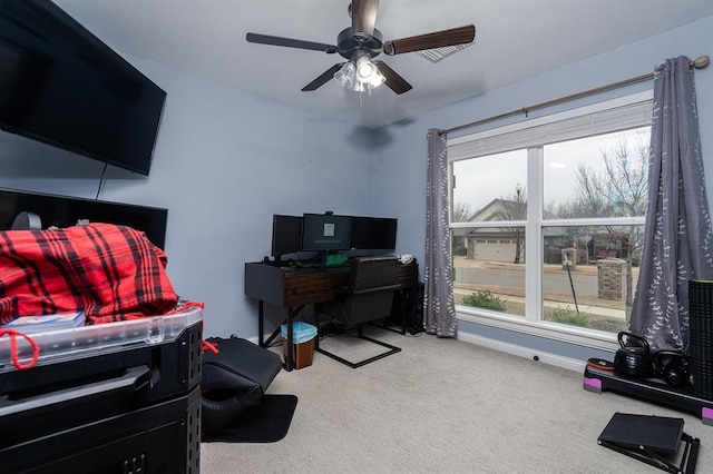 24 Carat Dr, Yukon, OK 73099 - carpeted home office with ceiling fan and healthy amount of natural light