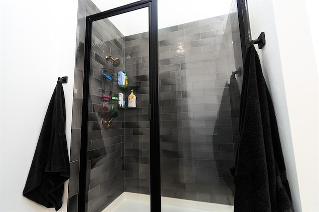 bathroom featuring an enclosed shower