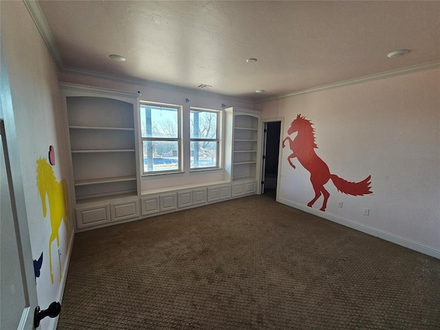 unfurnished room featuring dark carpet and crown molding