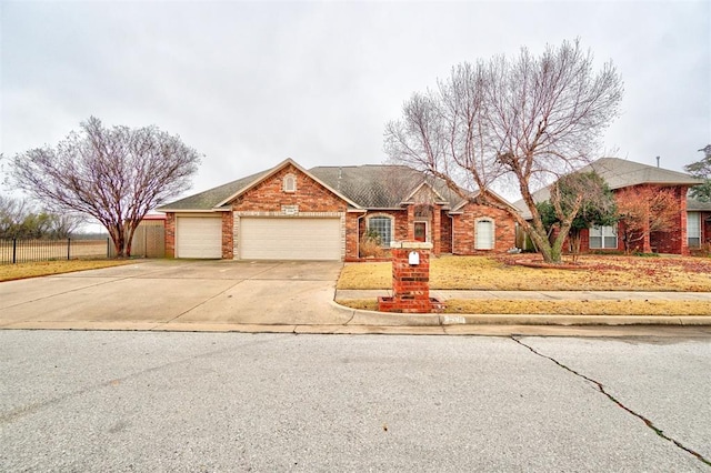 ranch-style home featuring a garage