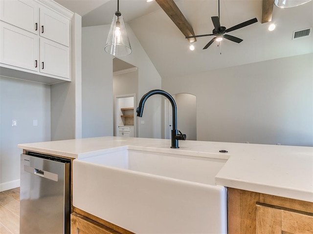 kitchen featuring dishwasher, white cabinets, sink, light hardwood / wood-style flooring, and ceiling fan