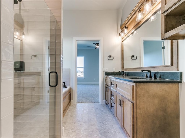 bathroom with vanity, separate shower and tub, and ceiling fan