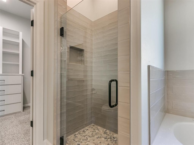 bathroom with independent shower and bath