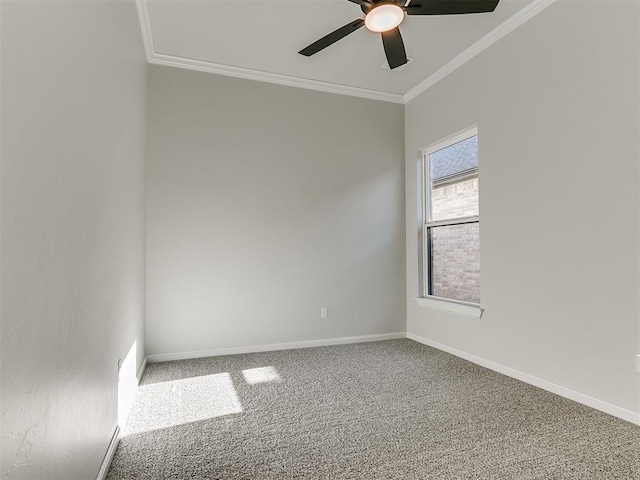 empty room featuring carpet, ceiling fan, and ornamental molding