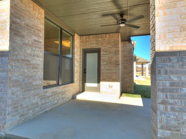 view of patio / terrace featuring ceiling fan