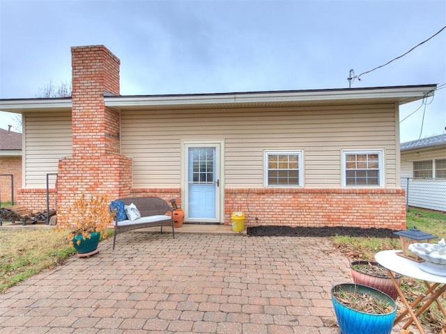 back of house featuring a patio