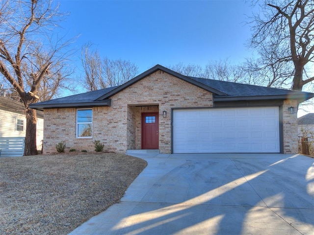 ranch-style house featuring a garage