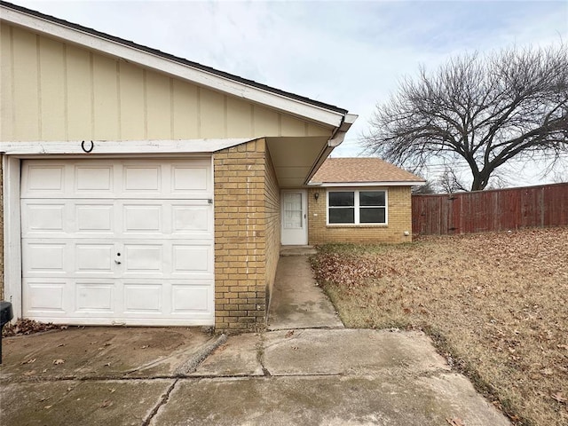 view of exterior entry featuring a garage