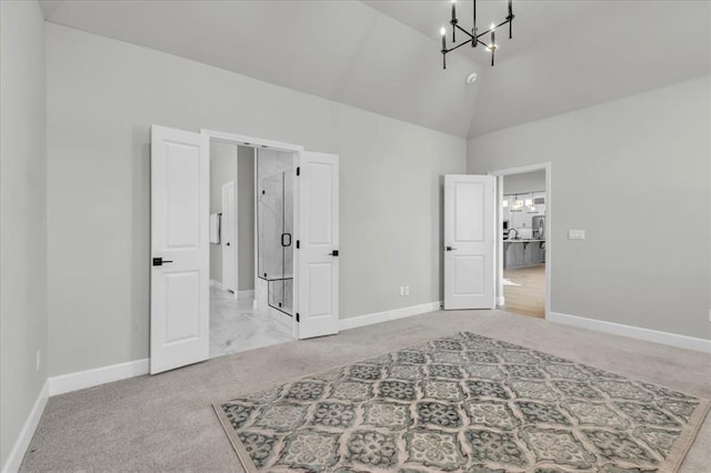 carpeted bedroom featuring high vaulted ceiling and a chandelier