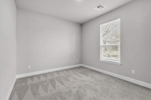 view of carpeted spare room