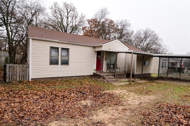 view of front of house featuring a carport