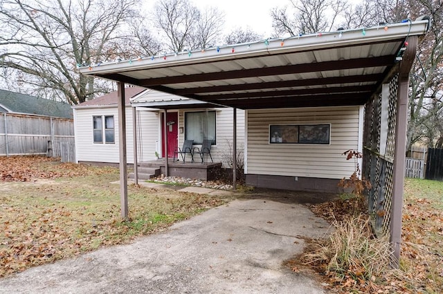 view of front of property with a carport