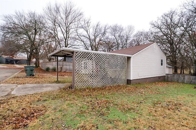 view of home's exterior with a yard