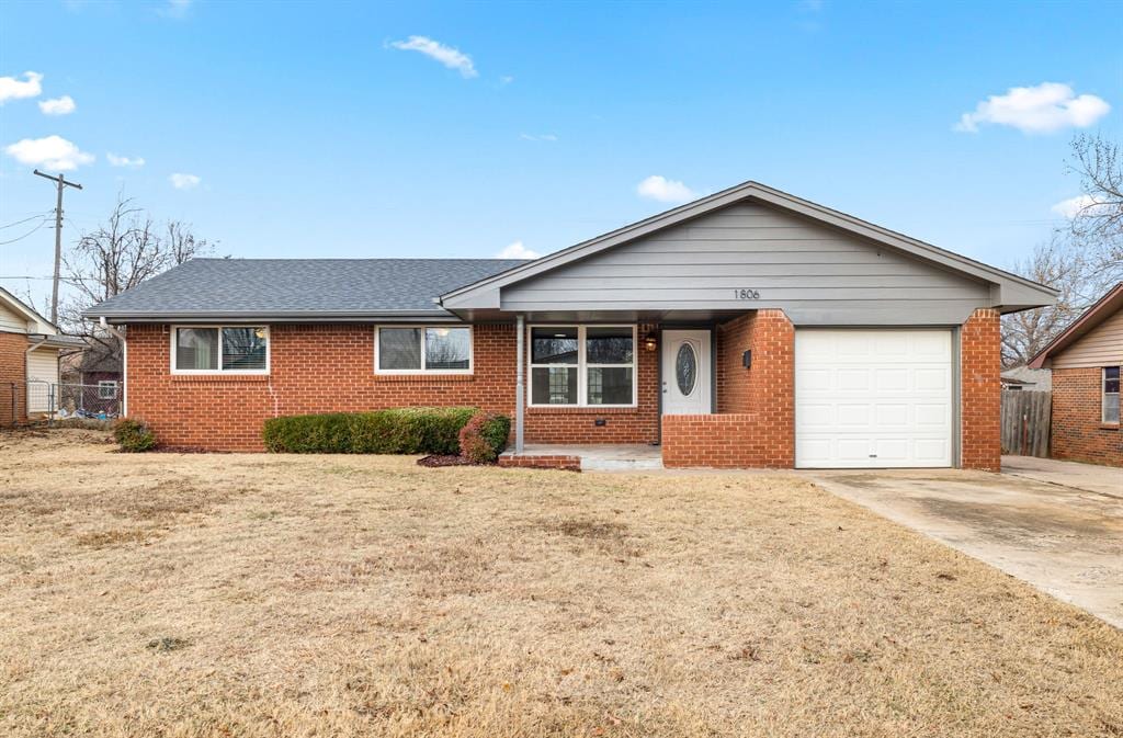 single story home with a garage