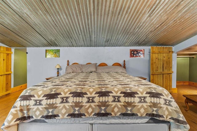 bedroom featuring light hardwood / wood-style flooring