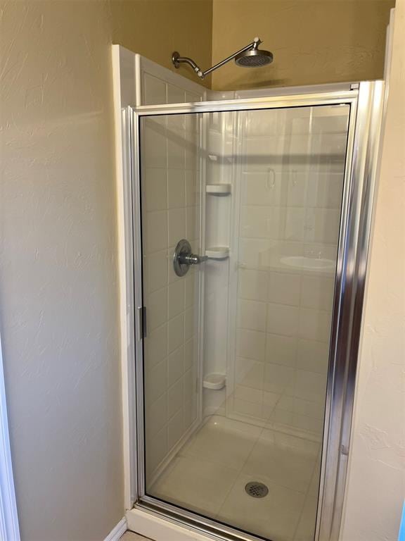 bathroom featuring walk in shower