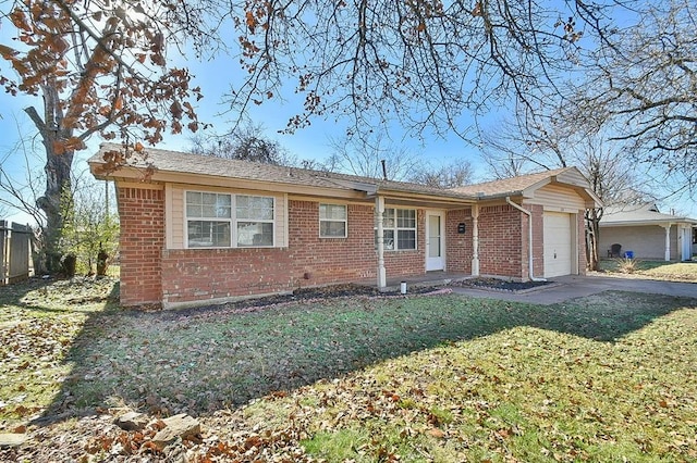 ranch-style house with a front lawn and a garage