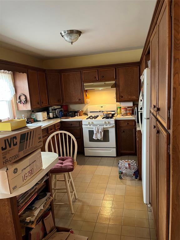 kitchen featuring white appliances