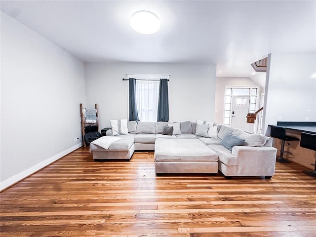 living room with light hardwood / wood-style flooring