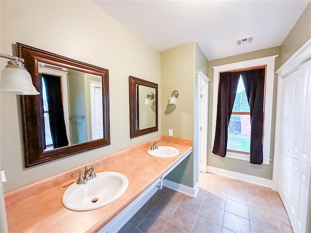 bathroom featuring vanity and tile patterned floors