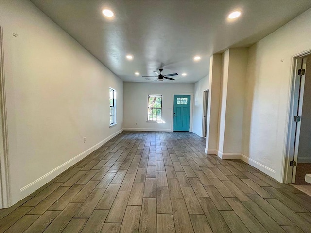 interior space featuring ceiling fan