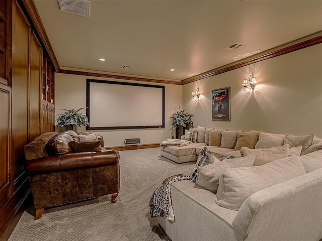 cinema room featuring ornamental molding