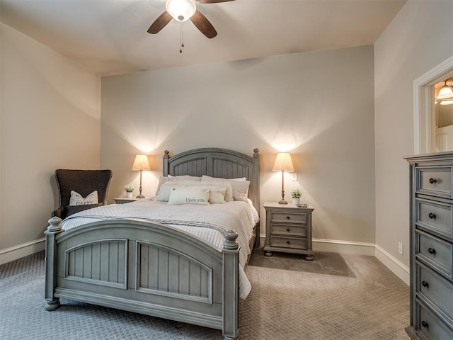 bedroom featuring ceiling fan and dark carpet