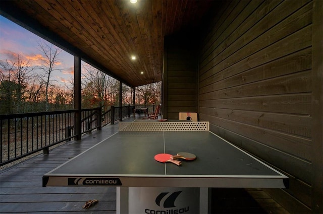 recreation room with recessed lighting, wooden ceiling, and wooden walls