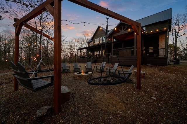 exterior space featuring a fire pit