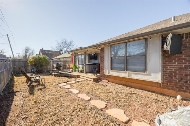 back of property with a patio area