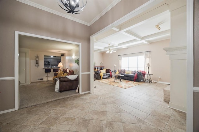 living room featuring light tile patterned floors, ceiling fan, coffered ceiling, ornamental molding, and beamed ceiling