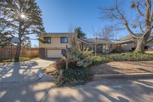 view of front of property featuring a garage