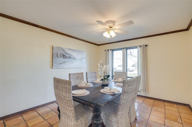 tiled dining area featuring ceiling fan and ornamental molding