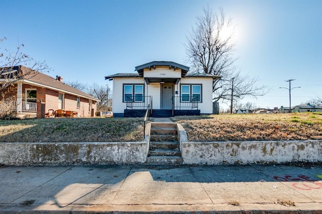 bungalow featuring a porch