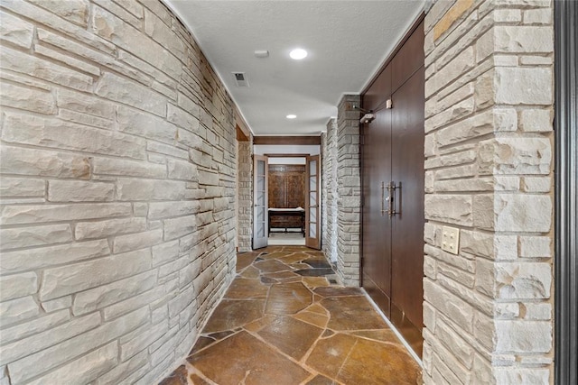 hallway with crown molding