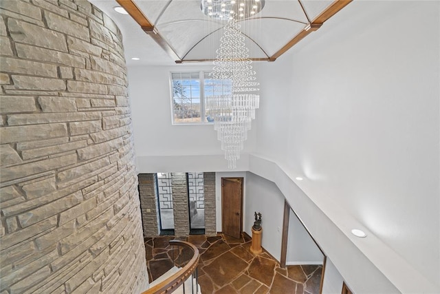 entrance foyer with a chandelier