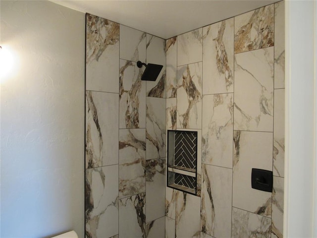 details with a tile shower