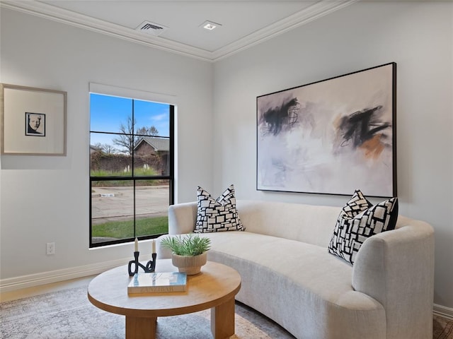 living room featuring hardwood / wood-style floors and ornamental molding