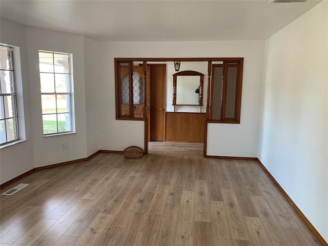 empty room featuring light hardwood / wood-style floors