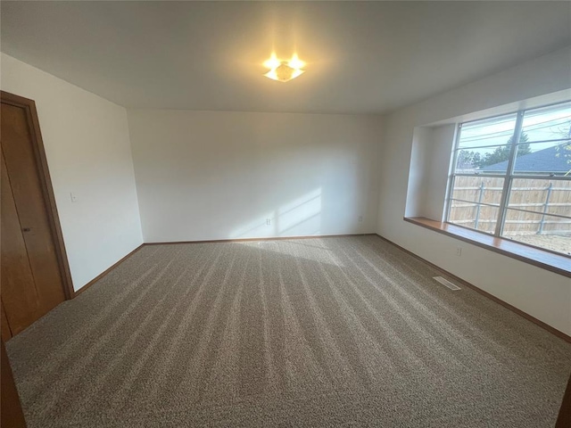 view of carpeted spare room