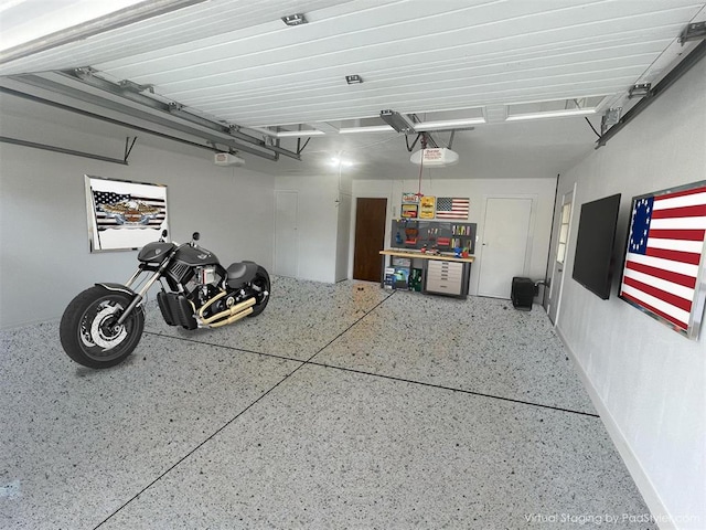 garage featuring a garage door opener