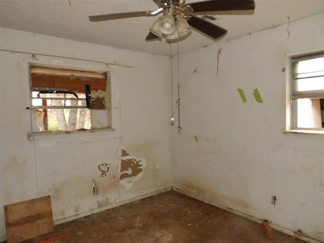 spare room featuring ceiling fan