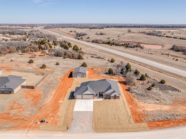 aerial view featuring a rural view and a desert view